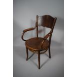 An Edwardian Bentwood Circular Seated Armchair