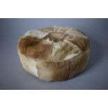 A Vintage Circular Animal Skin Pouffe, 38cms Diameter