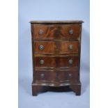 A Small Mahogany Serpentine Fronted Chest of Four Drawers, 48cms Wide and 73cms High