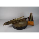 A Vintage Irish Bodhran Drum, 27cms Diameter, a Metal Music Stand and a Metronome