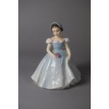 A Royal Doulton Figure, 'The Bridesmaid', HN2196