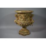 A Large and Elaborately Moulded Garden Urn having Lion Mask Handles and Scrolling Acanthus