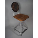 A Vintage Metal Framed Fixed Office Chair