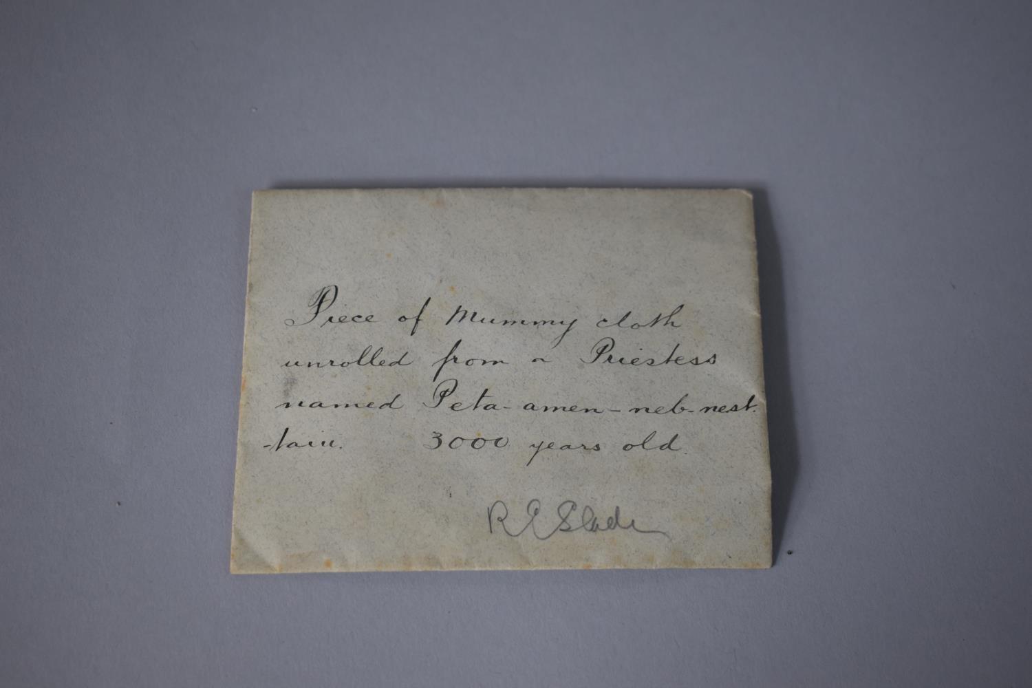 An Envelope with 19th Century Hand Written Inscription 'Piece of Mummy Cloth Unrolled from a