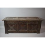 An Early Oak Three Panel Carved Oak Coffer Chest, 120cms Wide