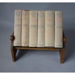 An Edwardian Oak Book Trough Containing Six Volumes of the Second World War by Winston Churchill.