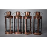 A Collection of Four Copper Lantern Tealight Holders, Each 27cms High