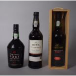 Three Bottles of Port comprising a Cased Bottle of Cockburns Later Bottled Vintage 1996 and Dows