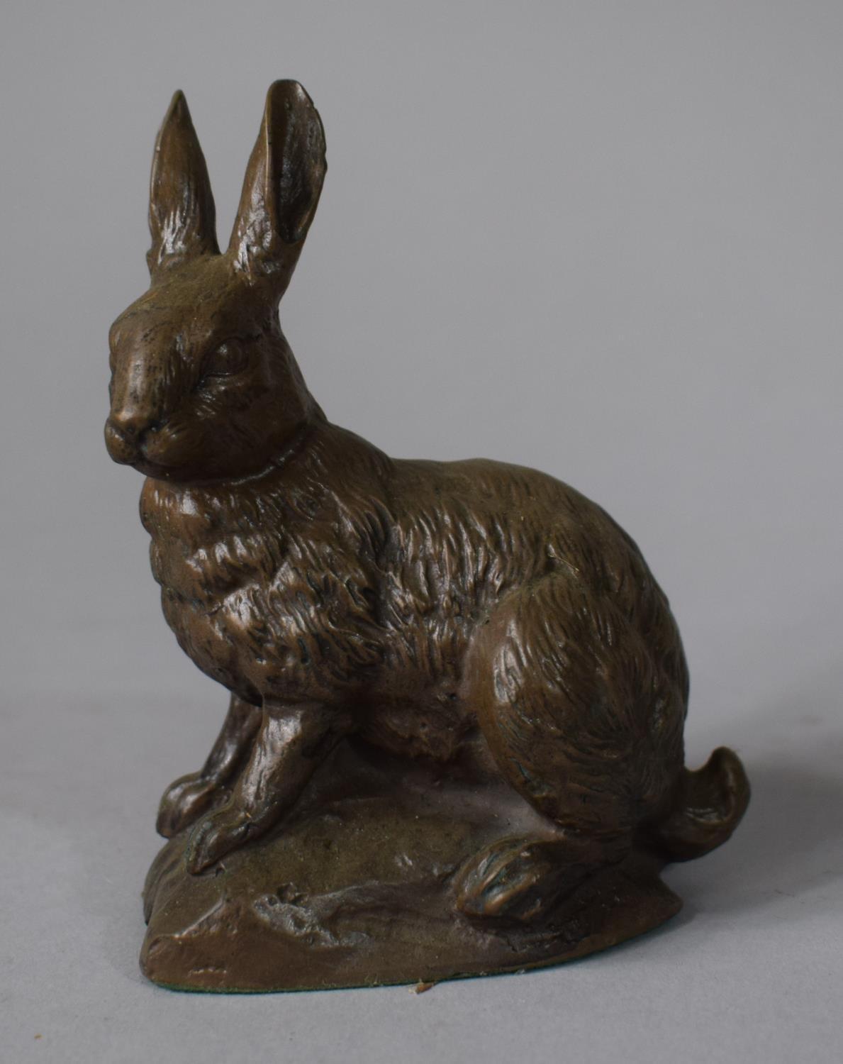 A Bronzed Resin Study of a Seated Hare, 11cms High