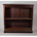A Mahogany Open Bookcase with Three Adjustable Shelves, 111cms Wide, Plinth Base