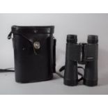 A Pair of Leather Cased Chinon 10 x 40 Field Binoculars