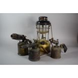 A Vintage Hurricane Lamp and Three Blow Torches