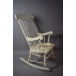 A White Painted Spindle Back Rocking Chair