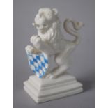 A German Nymphenburg Porcelain Heraldic Lion, 9cms High