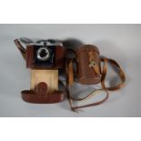 A Vintage Leather Cased Zeiss Ikon Nettar Camera with Novar Anastigmat Lens Together with Lens