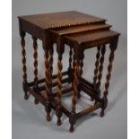 A Small Nest of Three Oak Tables with Barley Twist Supports, 41cms Wide