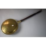 A Mid/Late 20th Century Brass Bed Warming Pan with Turned Wooden Handle