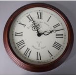 A Circular Battery Operated Westminster Chime Wall Clock, 35cms Diameter