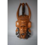 A Large Carved Wooden African Tribal Souvenir Mask, Hear No Evil, See No Evil, Speak No Evil.