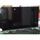 A Panasonic TX40CS520B Flat Screen TV with Remote