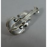 A Silver Brooch in the Form of a Double Bass