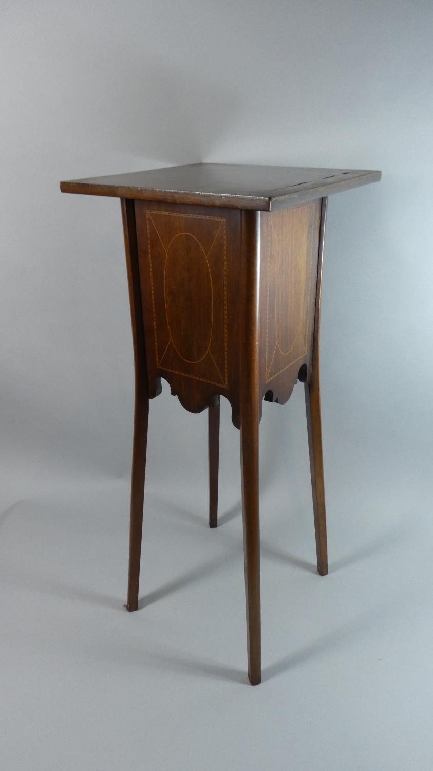 An Edwardian Inlaid Mahogany Plant Stand with 29cms Square Top, 71cms High