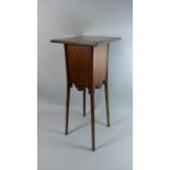 An Edwardian Inlaid Mahogany Plant Stand with 29cms Square Top, 71cms High