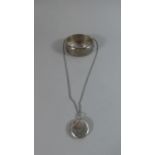 A Heavy Ladies Vintage Silver Bangle and a Similar Silver Pendant and Chain