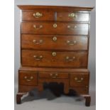 A Georgian Oak Chest on Stand, the Top with Two Short and Three Long Drawers with Brass Handles