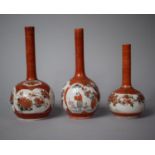 Three Meiji Period Japanese Kutani Iron Red Bottle Vases, Tallest 17cms High