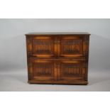 An Oak Two Tier Linenfold Side Cabinet, 94.5cms Wide