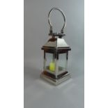 A Modern Chrome Candle Lantern, 39cms High