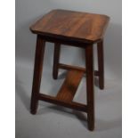 A Square Topped Mahogany Stool, 58cms High