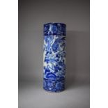 A Late 19th Century Oriental Blue and White Stick Stand with Bird Decoration, 62cms High (Restored
