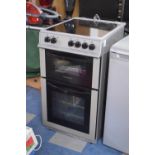 A Montpellier Four Ring Electric Cooker with Oven and Grill