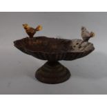 A Cast Iron Garden Bird Bath in the Form of Shell with Two Birds, 33cms Wide