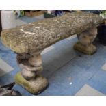 A Reconstituted Stone Rectangular Garden Bench with Squirrel Supports, 107cms Wide