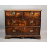 A 19th Century Oak Chest of Two Short and Two Long Drawers with Oval Brass Handles, 104cms Wide