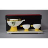 A Cased Yellow, White and Gilt Asianera Tea Set with Hand Painted Decoration