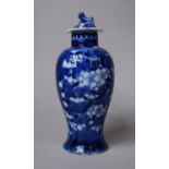 A Late 19th Century Chinese Blue and White Lidded Vase with Prunus Pattern Decoration Having Four