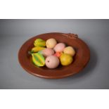 A Circular Moulded Bowl with Lizard Decoration Containing Artificial Fruit, 40cms Diameter
