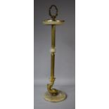 An Onyx and Gilt Metal Smokers Stand with Dolphin Terminal to Circular Plinth Base, 69cms High