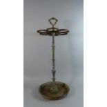 A 19th Century Cast Iron Six Division Stick and Umbrella Stand on Circular Tray Base, 65cms High