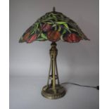 A Reproduction Bronzed Table Lamp with Tiffany Style Shade, 63cms High