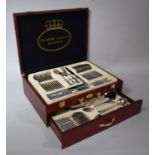 A Cased Classic Solingen Canteen of Cutlery with Hinged Lid and Fitted Drawer