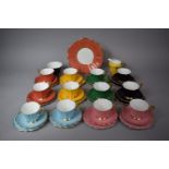 A Regency China Harlequin Tea Set Comprising 11 Cups, 12 Saucers, 12 Side Plates, Cake Plate, Milk