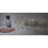 A Collection of Glassware to Include Decanters, Perfume Bottles, Coloured Glass Etc.