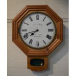 A Pine Framed Octagonal Enamelled Faced Wall Clock by J&L Hardisty, Buerton Audlem, Cheshire