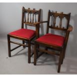 A Set of Six Gothic Style Oak Dining Chairs with Carved Top Rails