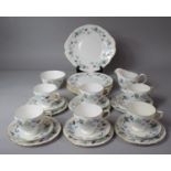 A Colclough Tea Set Comprising Six Trios, Six Plates and Cake Plate